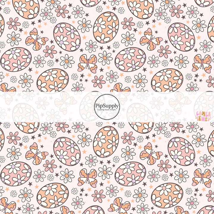 This Easter themed fabric by the yard features peachy orange and pink floral Easter eggs. This fun pattern fabric can be used for all your sewing and crafting needs!