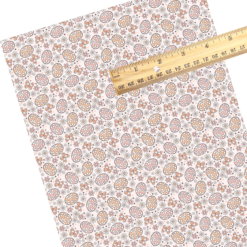 These floral themed faux leather sheets contain the following design elements: peachy orange and pink floral Easter eggs. Our CPSIA compliant faux leather sheets or rolls can be used for all types of crafting projects.