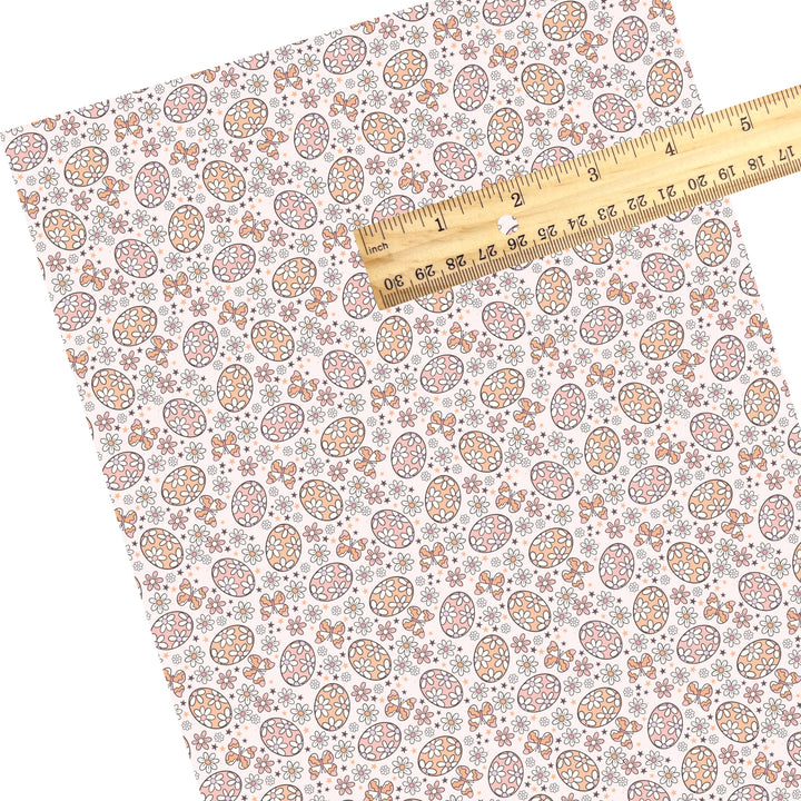 These floral themed faux leather sheets contain the following design elements: peachy orange and pink floral Easter eggs. Our CPSIA compliant faux leather sheets or rolls can be used for all types of crafting projects.