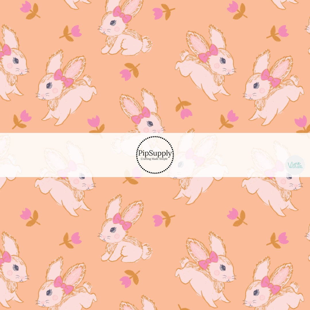 These spring pattern themed no sew bow strips can be easily tied and attached to a clip for a finished hair bow. These patterned bow strips are great for personal use or to sell. These bow strips features pink tulips surrounding cream bunnies on peach. 