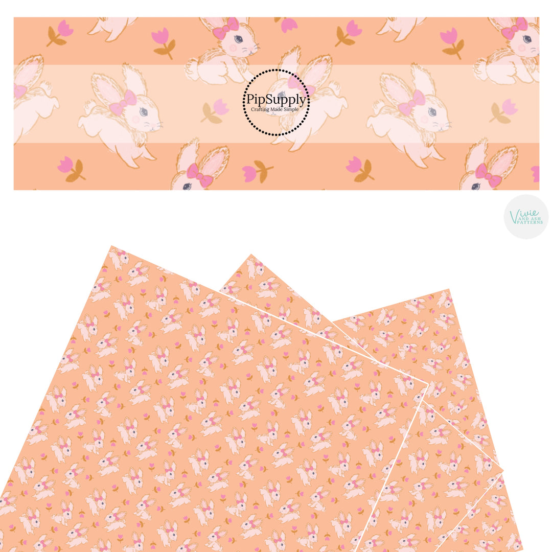 These spring pattern themed faux leather sheets contain the following design elements: pink tulips surrounding cream bunnies on peach. Our CPSIA compliant faux leather sheets or rolls can be used for all types of crafting projects.