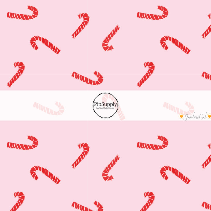 These Christmas themed no sew bow strips can be easily tied and attached to a clip for a finished hair bow. These fun patterned bow strips are great for personal use or to sell. These bow strips feature the following design elements: candy canes on pink.