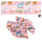 These celebration themed no sew bow strips can be easily tied and attached to a clip for a finished hair bow. These patterned bow strips are great for personal use or to sell. These bow strips features colorful animals with party hats on light pink.