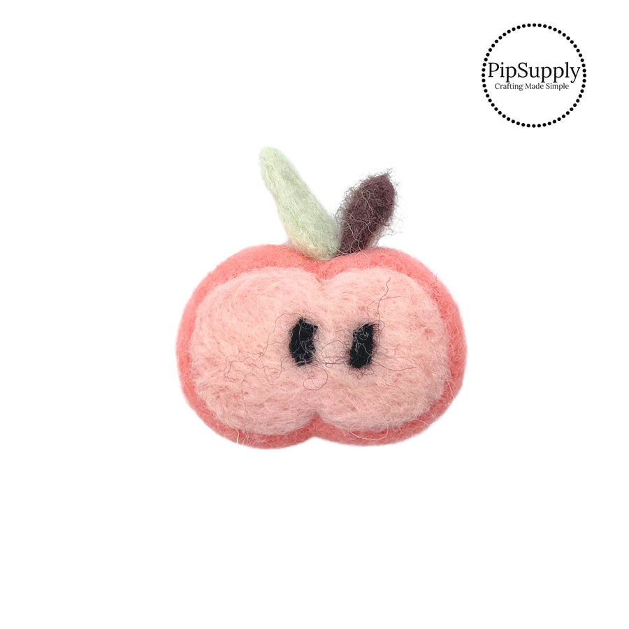 Pink halved apple with seeds felt embellishment