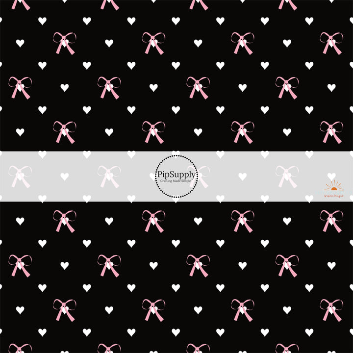 This holiday fabric by the yard features pink bows and white hearts on black. This festive pattern fabric can be used for all your sewing and crafting needs!