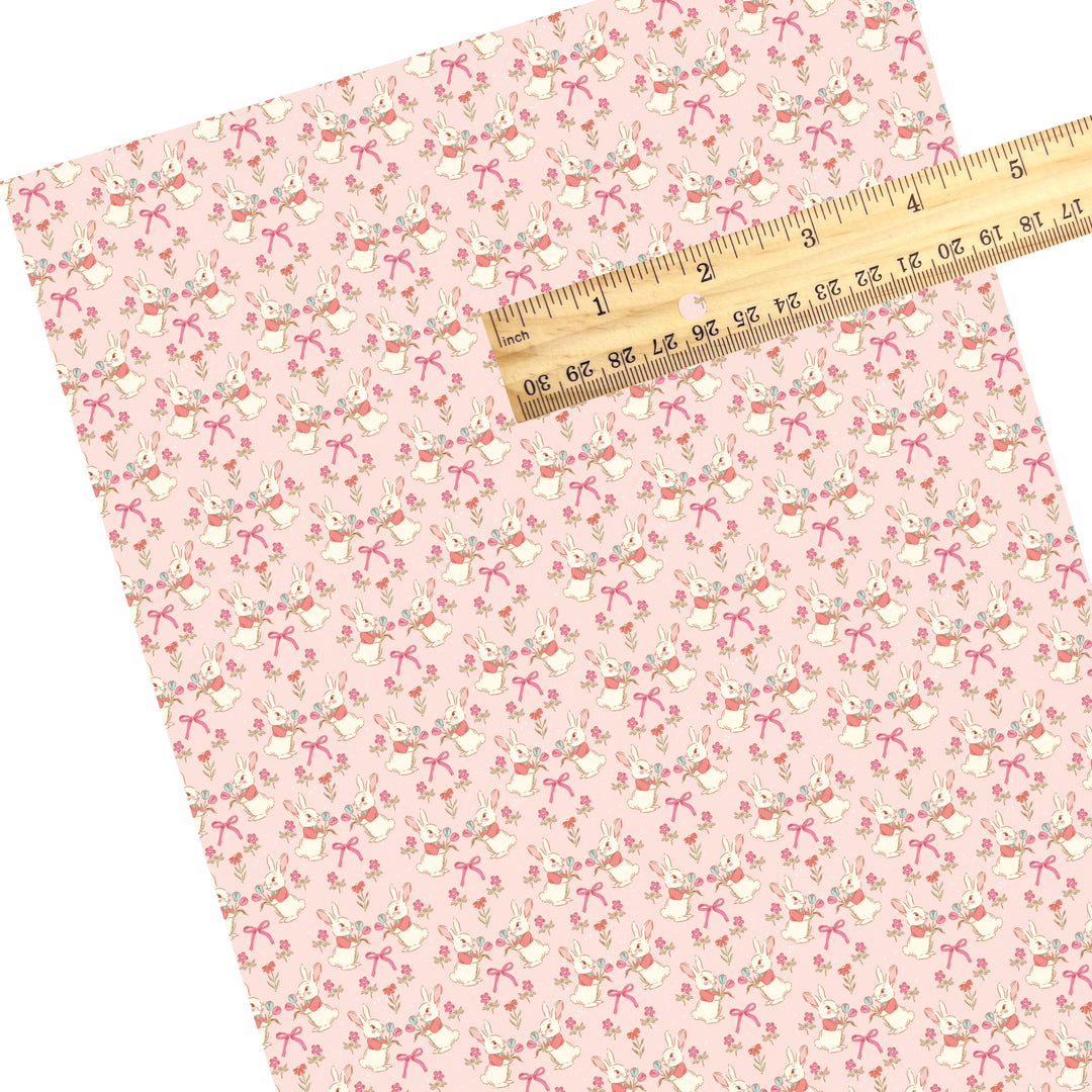 These Easter themed faux leather sheets contain the following design elements: Easter bunnies and flowers on pink. Our CPSIA compliant faux leather sheets or rolls can be used for all types of crafting projects.