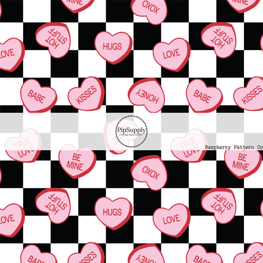 Scattered pink hearts with sayings on black and white checkered hair bow strips