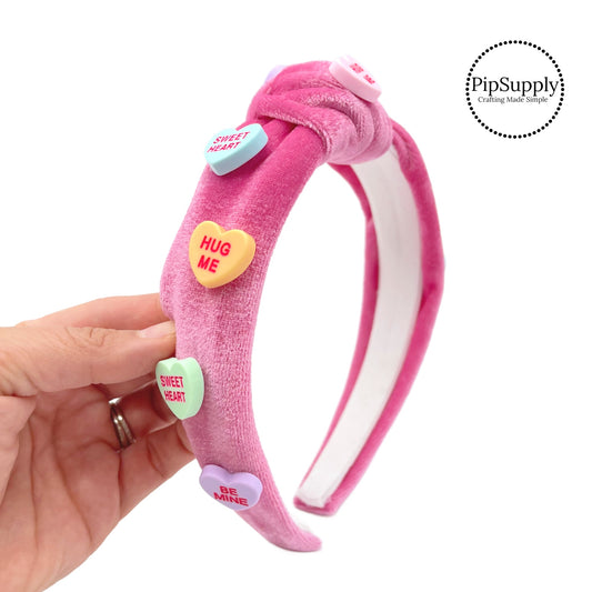 Pastel conversation hearts on pink velvet knotetd headband 