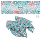 These floral themed blue no sew bow strips can be easily tied and attached to a clip for a finished hair bow. These fun summer floral themed bow strips features hot pink, light pink, and aqua flowers on blue are great for personal use or to sell.