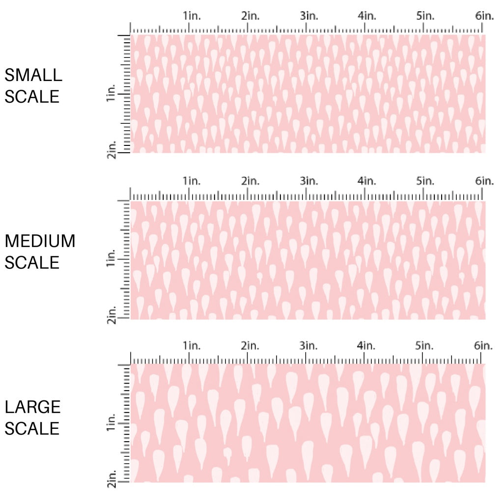 This spring themed fabric by the yard features drops on light pink. This fun pattern fabric can be used for all your sewing and crafting needs!