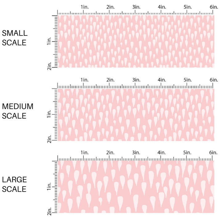 This spring themed fabric by the yard features drops on light pink. This fun pattern fabric can be used for all your sewing and crafting needs!