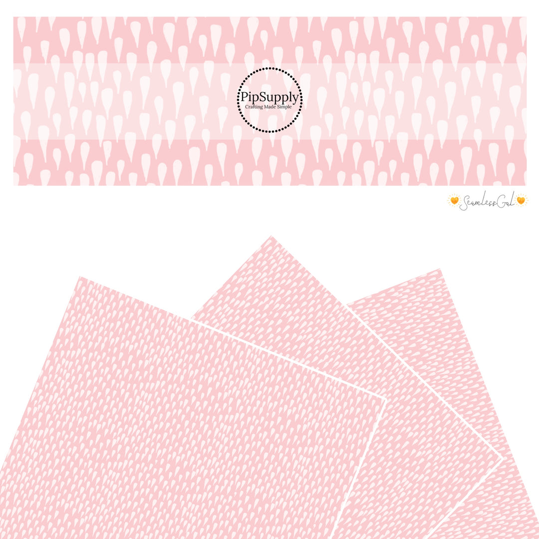 These spring themed faux leather sheets contain the following design elements: drops on light pink. Our CPSIA compliant faux leather sheets or rolls can be used for all types of crafting projects.