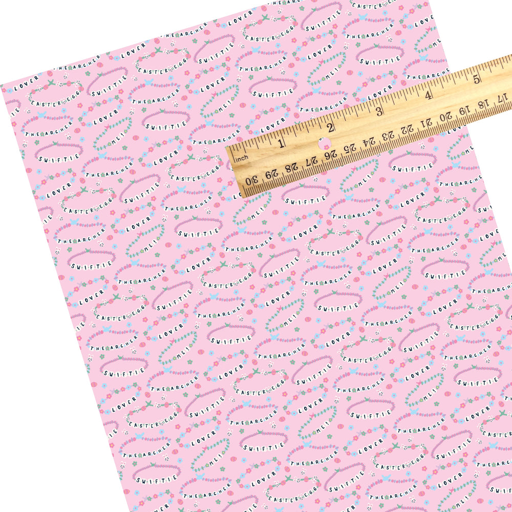 These Easter themed faux leather sheets contain the following design elements: friendship bracelets on pink. Our CPSIA compliant faux leather sheets or rolls can be used for all types of crafting projects.