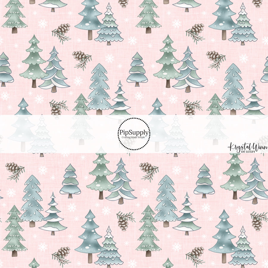 These winter themed pattern fabric by the yard features the following design elements: winter trees on pink. This fun themed fabric can be used for all your sewing and crafting needs!