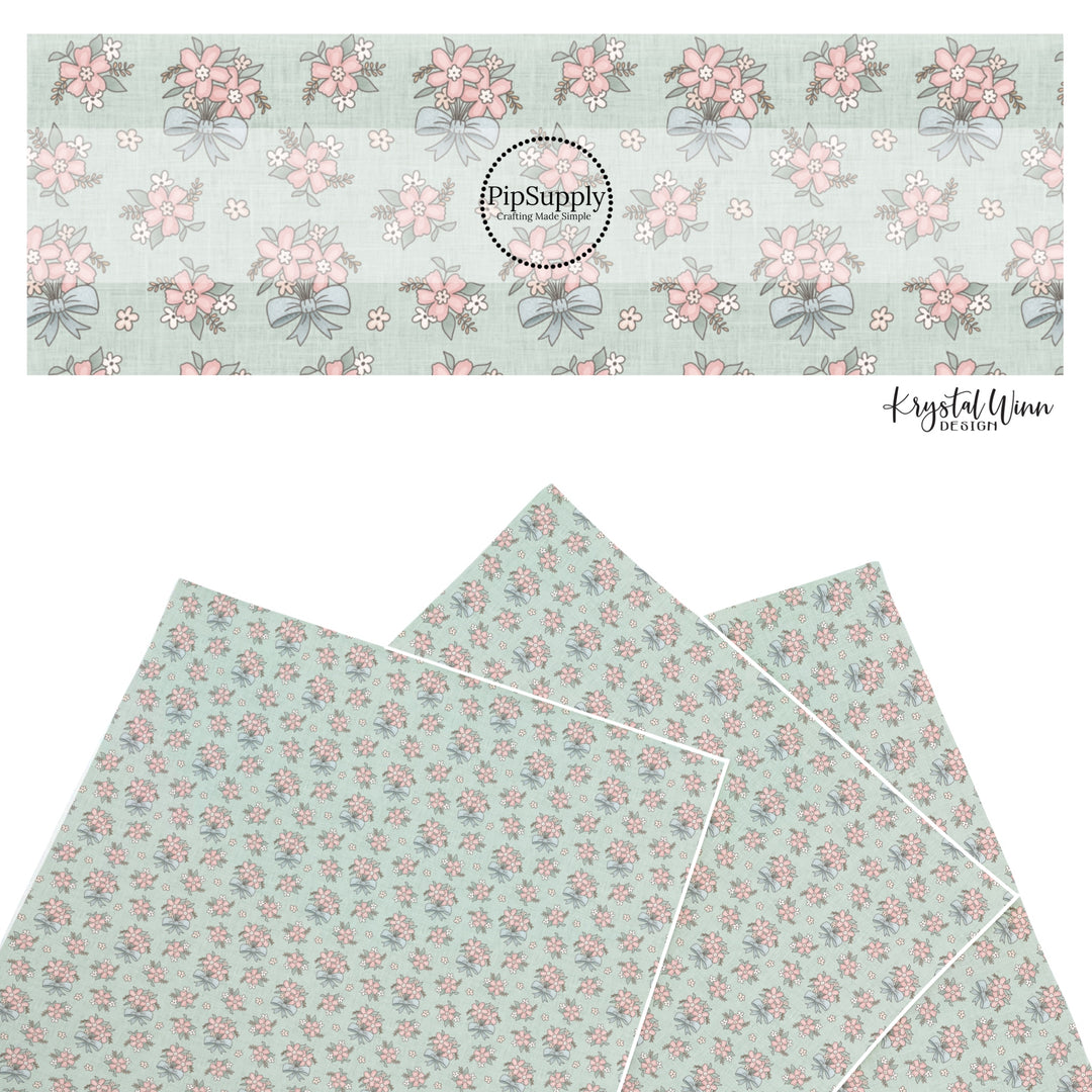 These floral themed faux leather sheets contain the following design elements: pink flower bundles with blue bows. Our CPSIA compliant faux leather sheets or rolls can be used for all types of crafting projects.