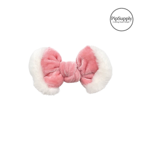 white fur on pink knotted bow