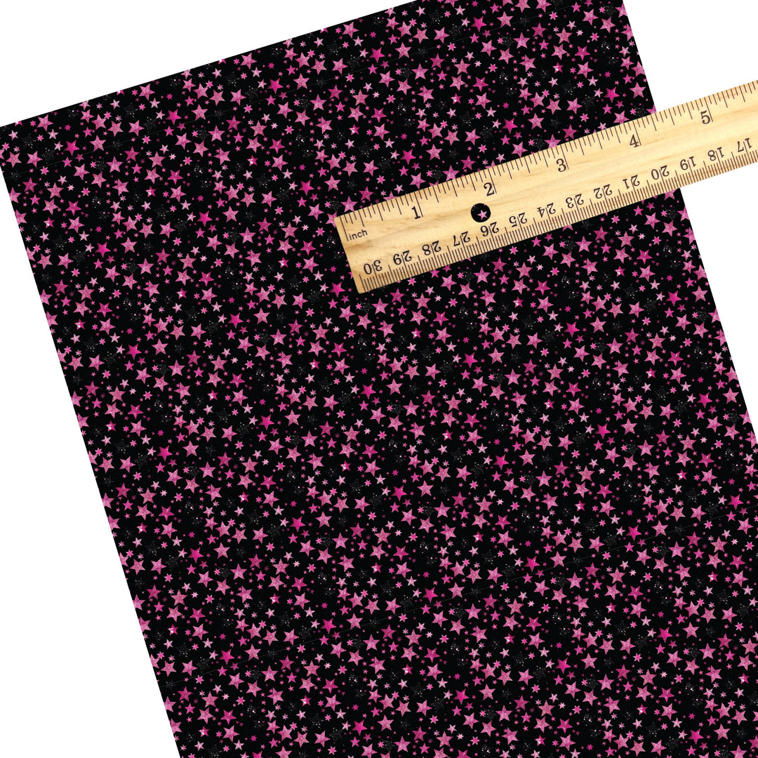 These holiday faux leather sheets contain the following design elements: pink stars on black. Our CPSIA compliant faux leather sheets or rolls can be used for all types of crafting projects.