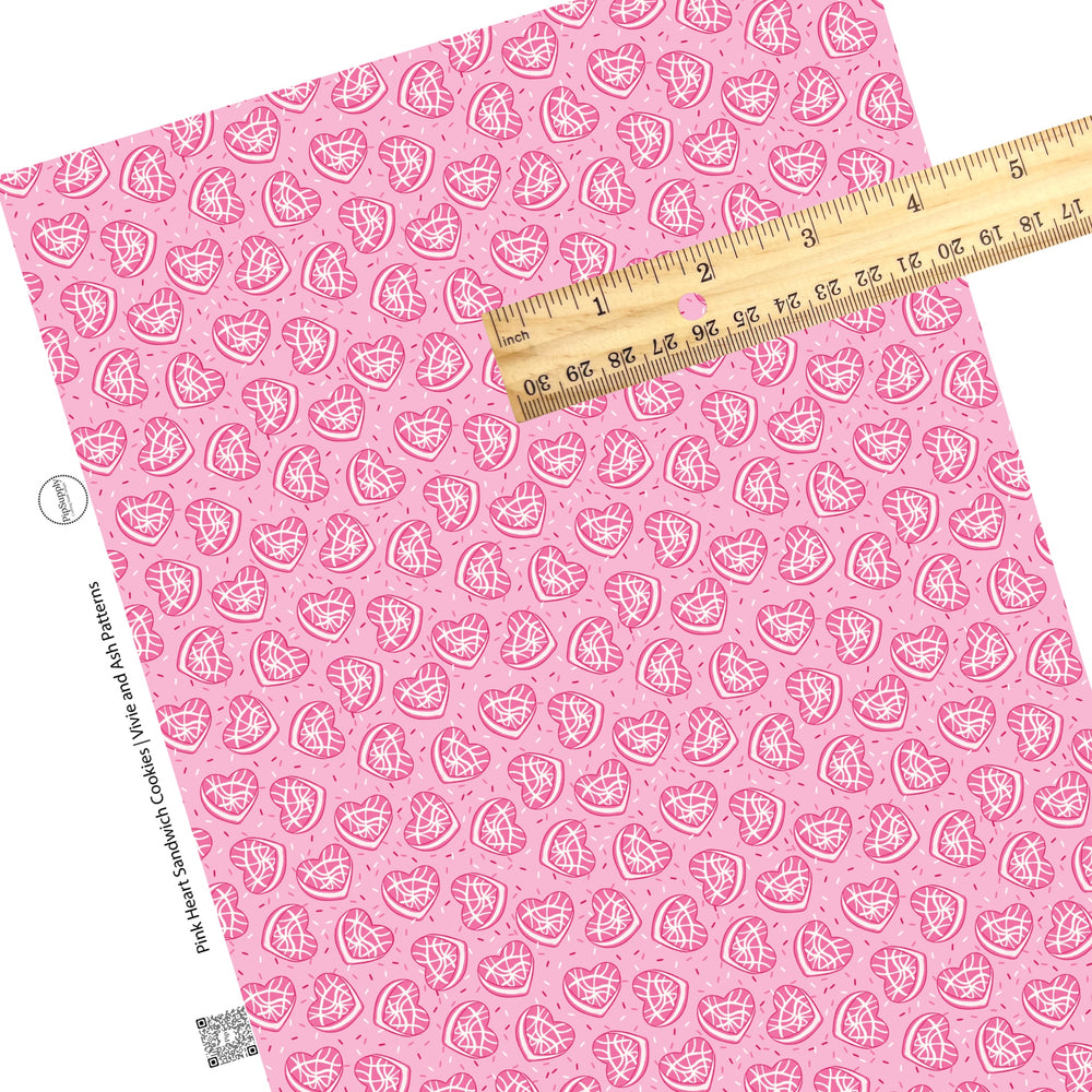 These Valentine's Day pattern faux leather sheets contain the following design elements: heart shaped cookies on pink. Our CPSIA compliant faux leather sheets or rolls can be used for all types of crafting projects.