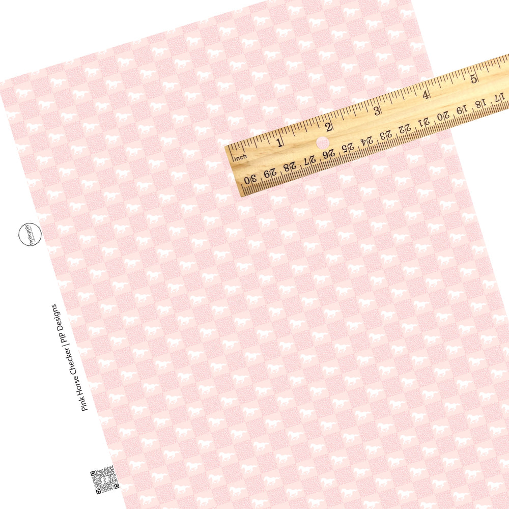 These western pink pattern themed faux leather sheets contain the following design elements: white horses in pink checker pattern. Our CPSIA compliant faux leather sheets or rolls can be used for all types of crafting projects. The designer of this pattern is Hay Sis Hay. 