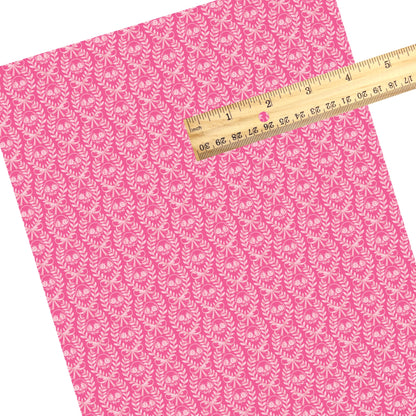 These Halloween themed pattern faux leather sheets contain the following design elements: cream laurel leaf pattern with skulls on pink. Our CPSIA compliant faux leather sheets or rolls can be used for all types of crafting projects.