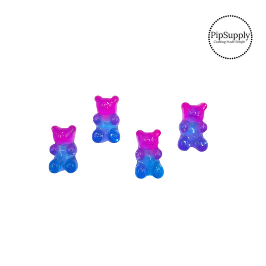 Silver glitter on pink, lavender, and blue ombre glossy gummy bear flat back resin embellishment