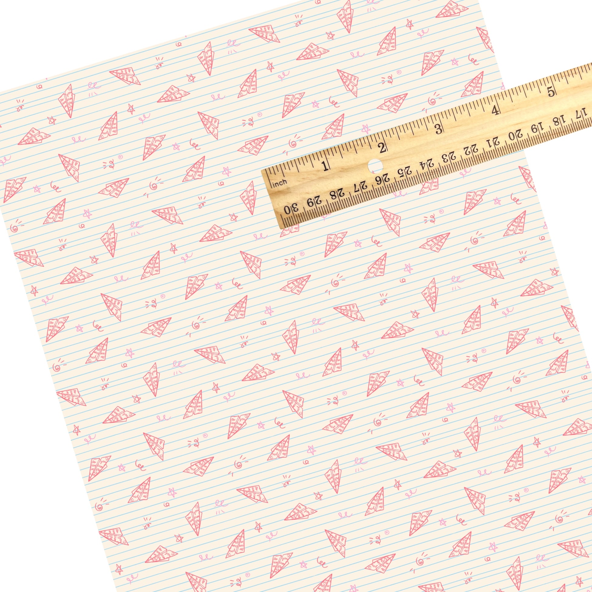 These school themed faux leather sheets contain the following design elements: pink airplanes on cream. Our CPSIA compliant faux leather sheets or rolls can be used for all types of crafting projects.