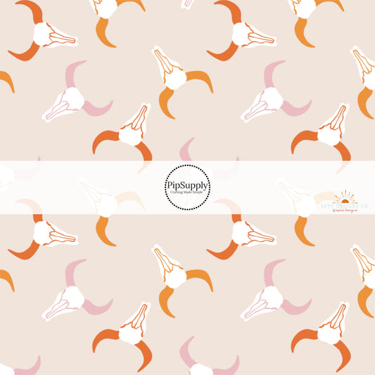 Western themed pink and orange longhorns fabric by the yard. 