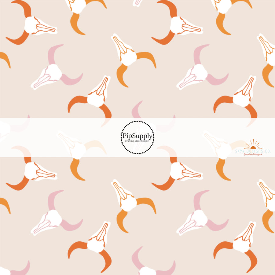 Western themed pink and orange longhorns fabric by the yard. 