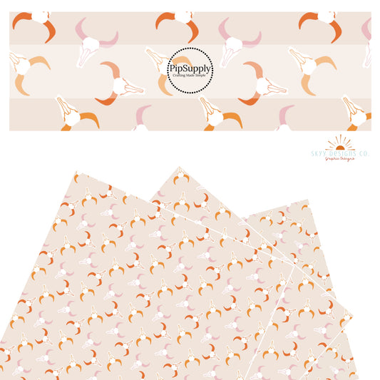 Western themed pink and orange longhorns faux leather sheets. 