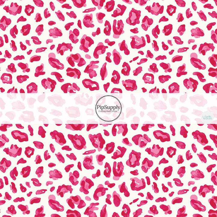 This holiday fabric by the yard features pink leopard pattern. This festive pattern fabric can be used for all your sewing and crafting needs!