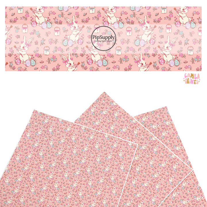 These Easter themed faux leather sheets contain the following design elements: Easter bunnies painting Easter eggs on pink. Our CPSIA compliant faux leather sheets or rolls can be used for all types of crafting projects.