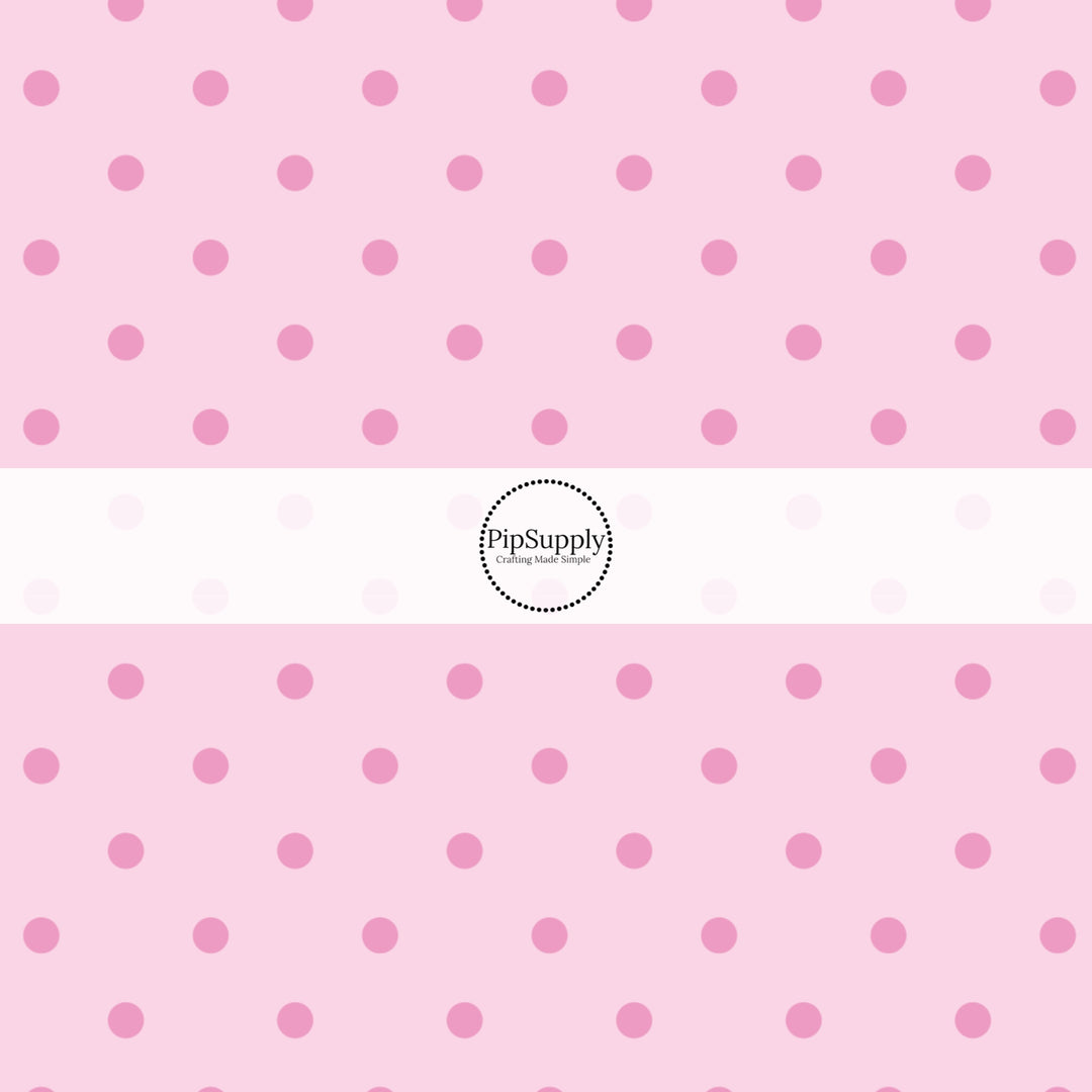 This celebration fabric by the yard features pink dots on light pink. This fun themed fabric can be used for all your sewing and crafting needs!