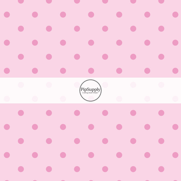 This celebration fabric by the yard features pink dots on light pink. This fun themed fabric can be used for all your sewing and crafting needs!