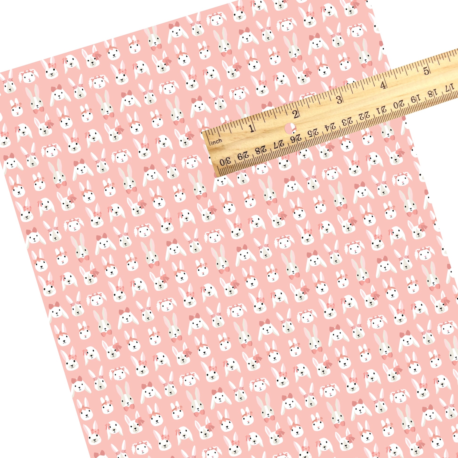 These summer faux leather sheets contain the following design elements: bunnies with bows on pink. Our CPSIA compliant faux leather sheets or rolls can be used for all types of crafting projects.