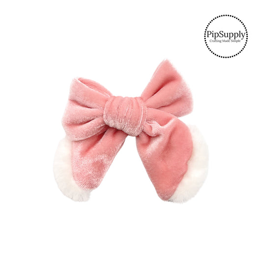 white fur on pink tied hair bow strip