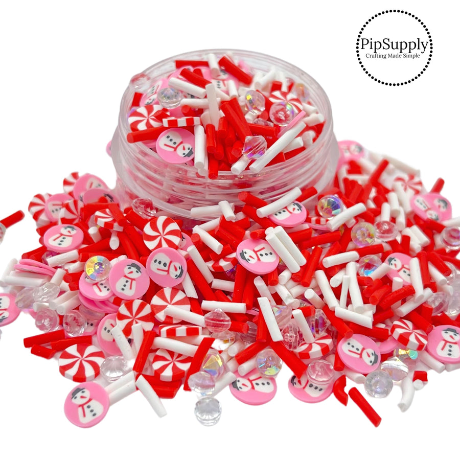 Candy cane swirls, snowman, sprinkles, and rhinestones