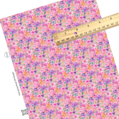 These floral pattern themed faux leather sheets contain the following design elements: multi colored flowers on pink. Our CPSIA compliant faux leather sheets or rolls can be used for all types of crafting projects.