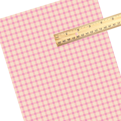 These summer faux leather sheets contain the following design elements: summer haze pink and cream plaid pattern. Our CPSIA compliant faux leather sheets or rolls can be used for all types of crafting projects.