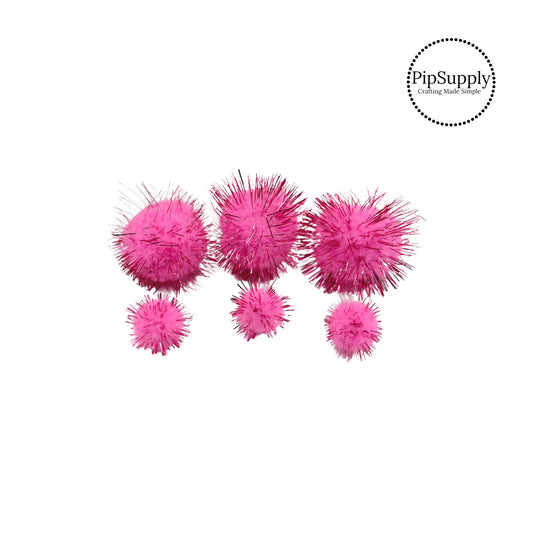 Small and large pink tinsel pom pom ball