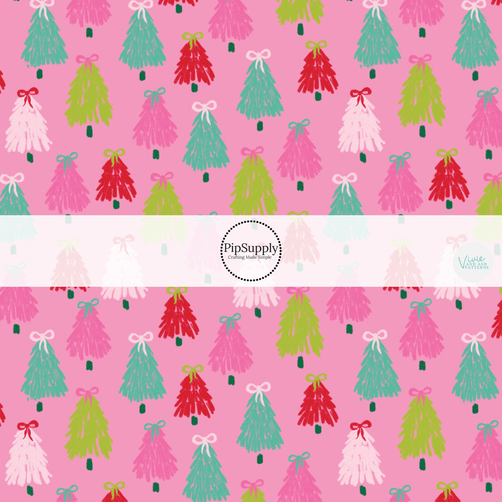 These winter Christmas tree themed no sew bow strips can be easily tied and attached to a clip for a finished hair bow. These fun patterned bow strips are great for personal use or to sell. These bow strips feature the following design elements: colorful Christmas trees with bows on pink.