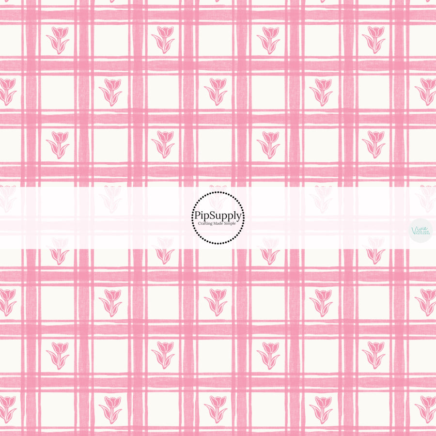 This Easter themed fabric by the yard features pink tulips on a light pink gingham pattern. This fun pattern fabric can be used for all your sewing and crafting needs!