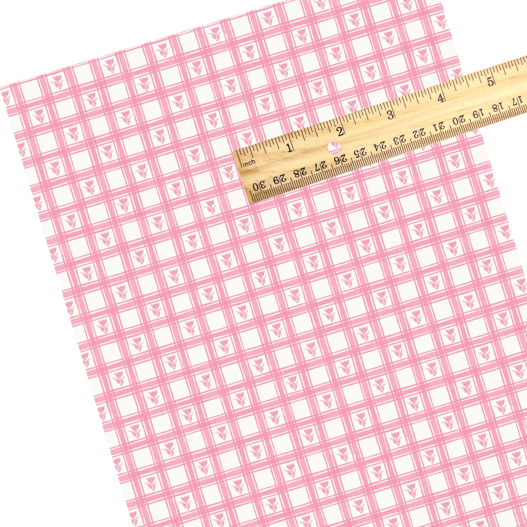 These Easter themed faux leather sheets contain the following design elements: pink tulips on a light pink gingham pattern. Our CPSIA compliant faux leather sheets or rolls can be used for all types of crafting projects.