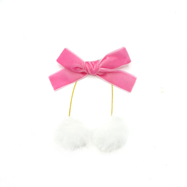 These Christmas velvet ribbon hair bow clips feature faux fur white pom poms. These bow clips can be used as piggie hair clips and are a stylish hair accessory and can be worn as they are. These hair clips are ready to wear or to sell to others.