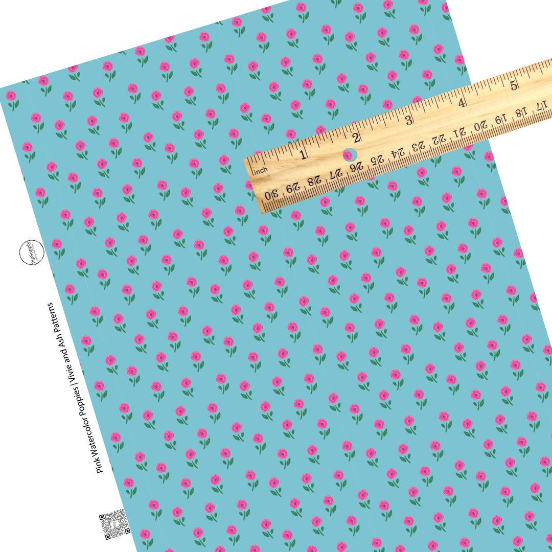 These floral pattern themed faux leather sheets contain the following design elements: pink watercolor poppies on blue. Our CPSIA compliant faux leather sheets or rolls can be used for all types of crafting projects.