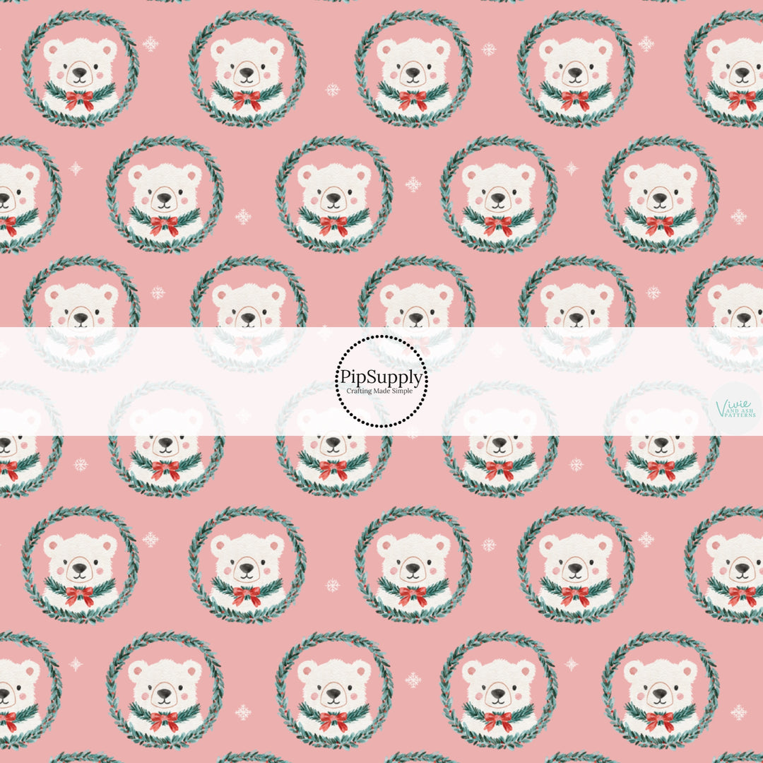 These Christmas themed pattern fabric by the yard features the following design elements: polar bear wreaths on pink. This fun themed fabric can be used for all your sewing and crafting needs!