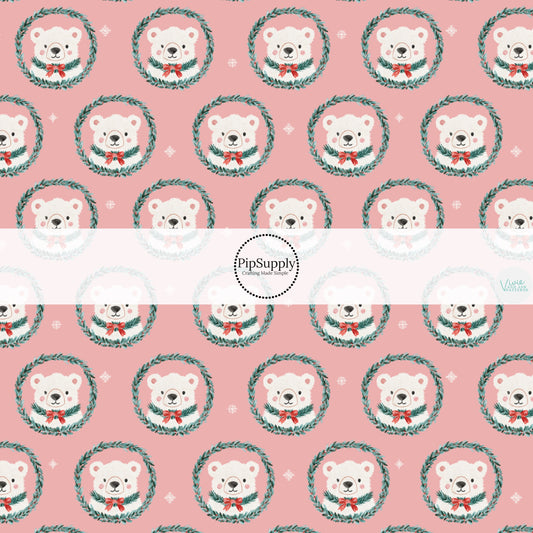 These Christmas themed pattern fabric by the yard features the following design elements: polar bear wreaths on pink. This fun themed fabric can be used for all your sewing and crafting needs!