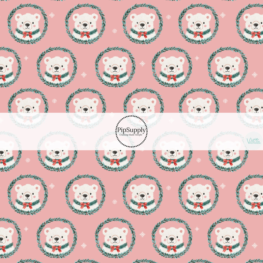 These Christmas themed pattern fabric by the yard features the following design elements: polar bear wreaths on pink. This fun themed fabric can be used for all your sewing and crafting needs!