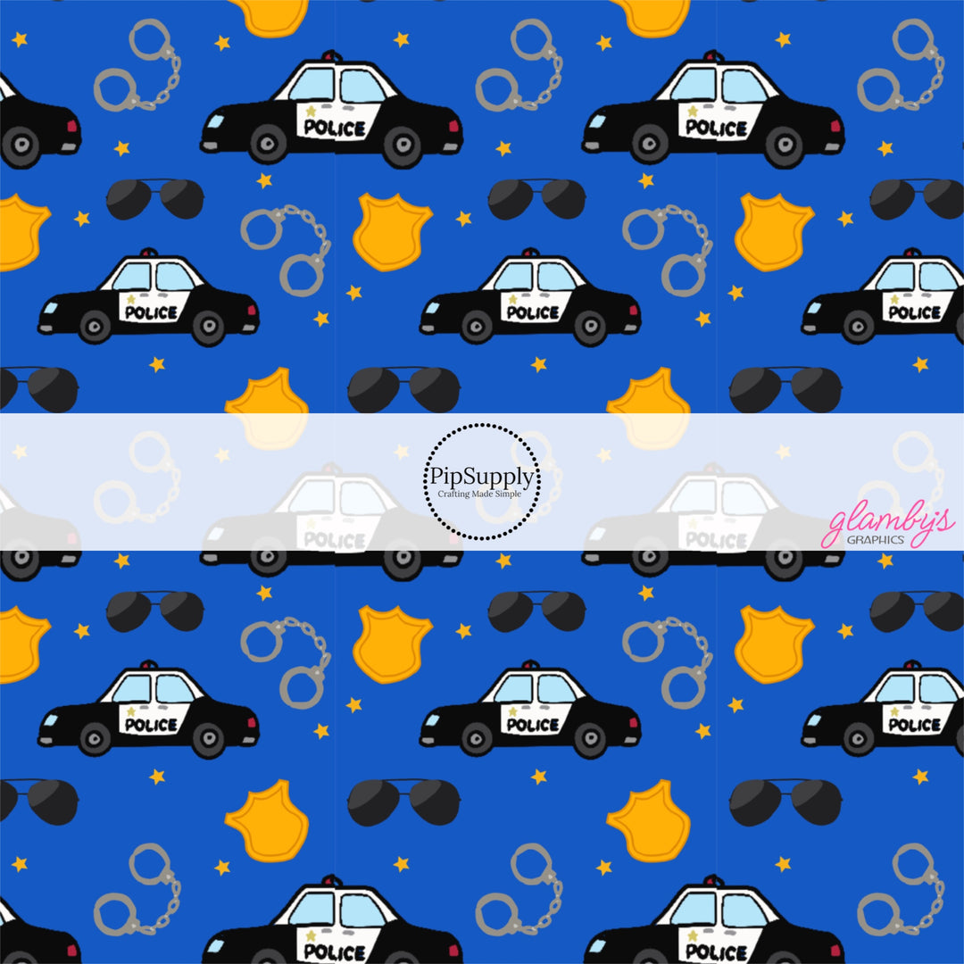 These police themed fabric by the yard features police cars, badges, and handcuffs. These pattern fabric can be used for all your sewing and crafting needs!