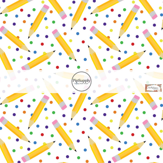 This school supply fabric by the yard features pencils and colorful dots. This fun themed fabric can be used for all your sewing and crafting needs!
