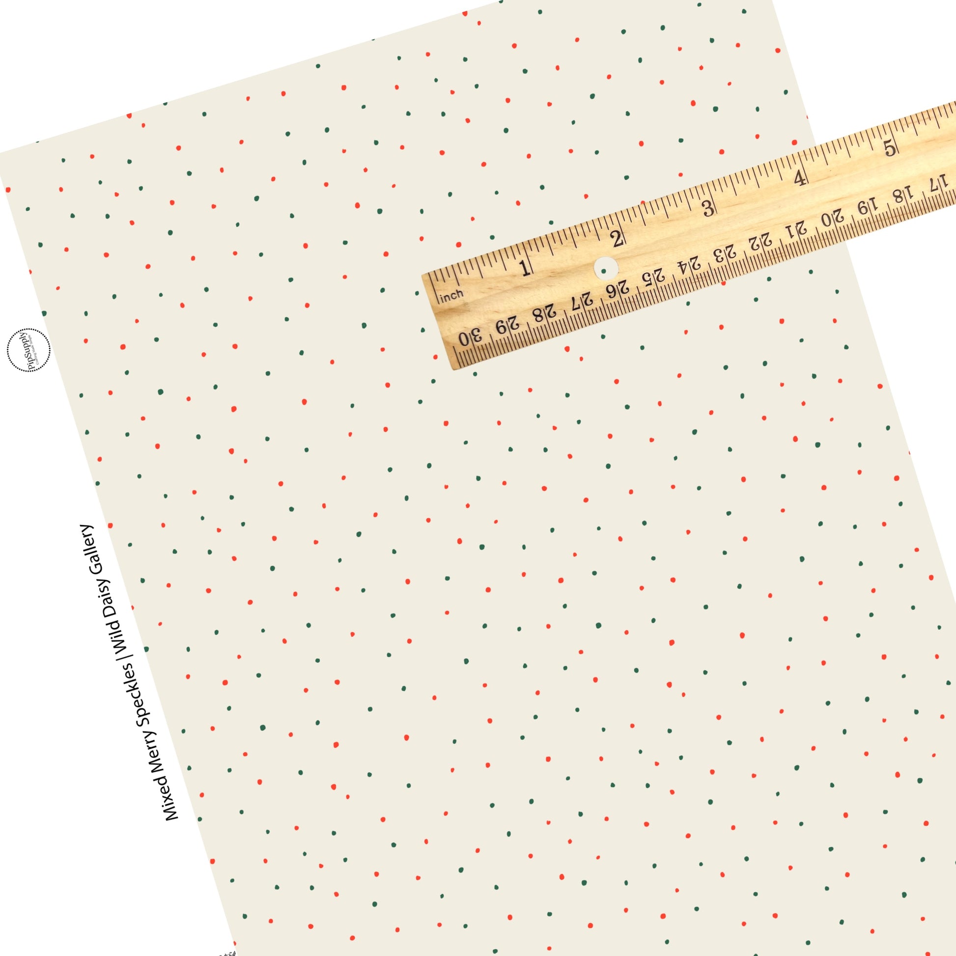Tiny green and red dots on cream faux leather sheets